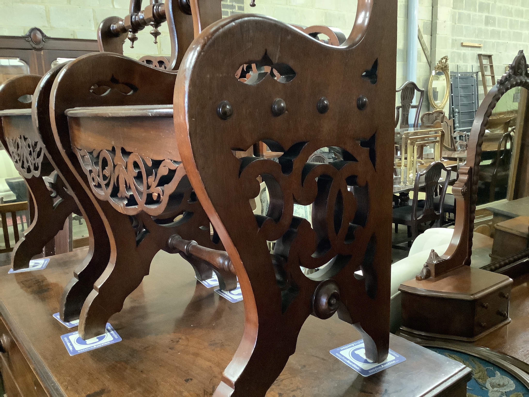 A pair of Victorian style mahogany hall seats in the manner of Shoolbred. W-47, D-38, H-76cm.